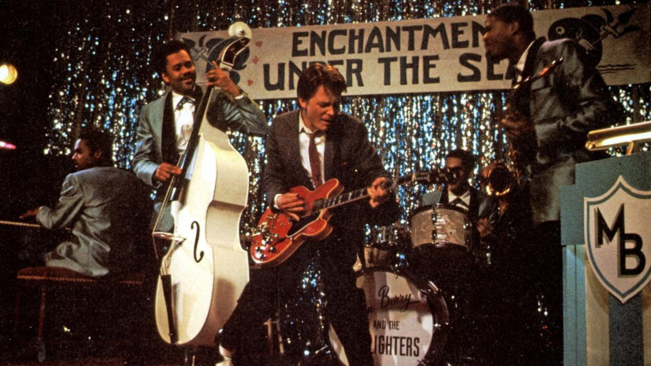 Michael J. Fox plays the original Gibson ES-345 guitar during the “Enchantment Under the Sea” school dance scene of the film BACK TO THE FUTURE.