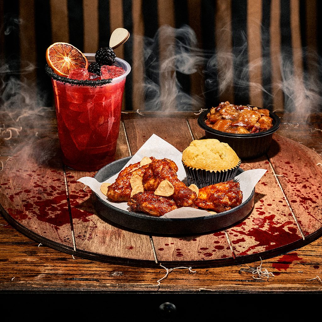 drink, chicken wings and corn bread muffin