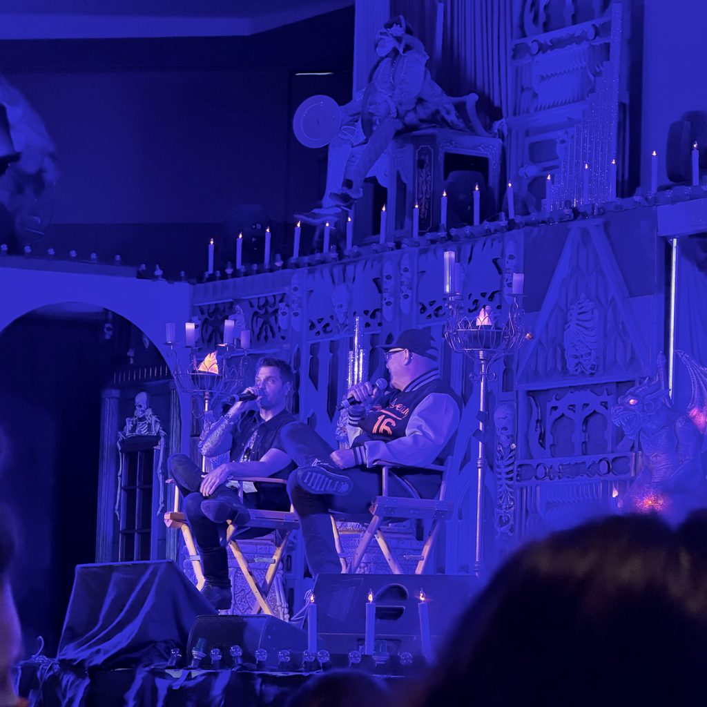 Spencer Charnas of Ice Nine Kills with John Murdy, Creative Direction and Exec. Producer of HHN Hollywood on stage at Midsummer Scream