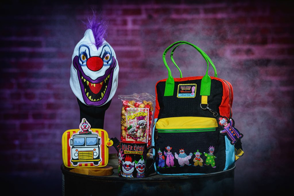 Killer Klowns from Outer Space merchandise including backpack, mask, popcorn and keychains