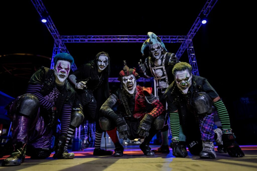 5 scareactor clowns pose for the camera