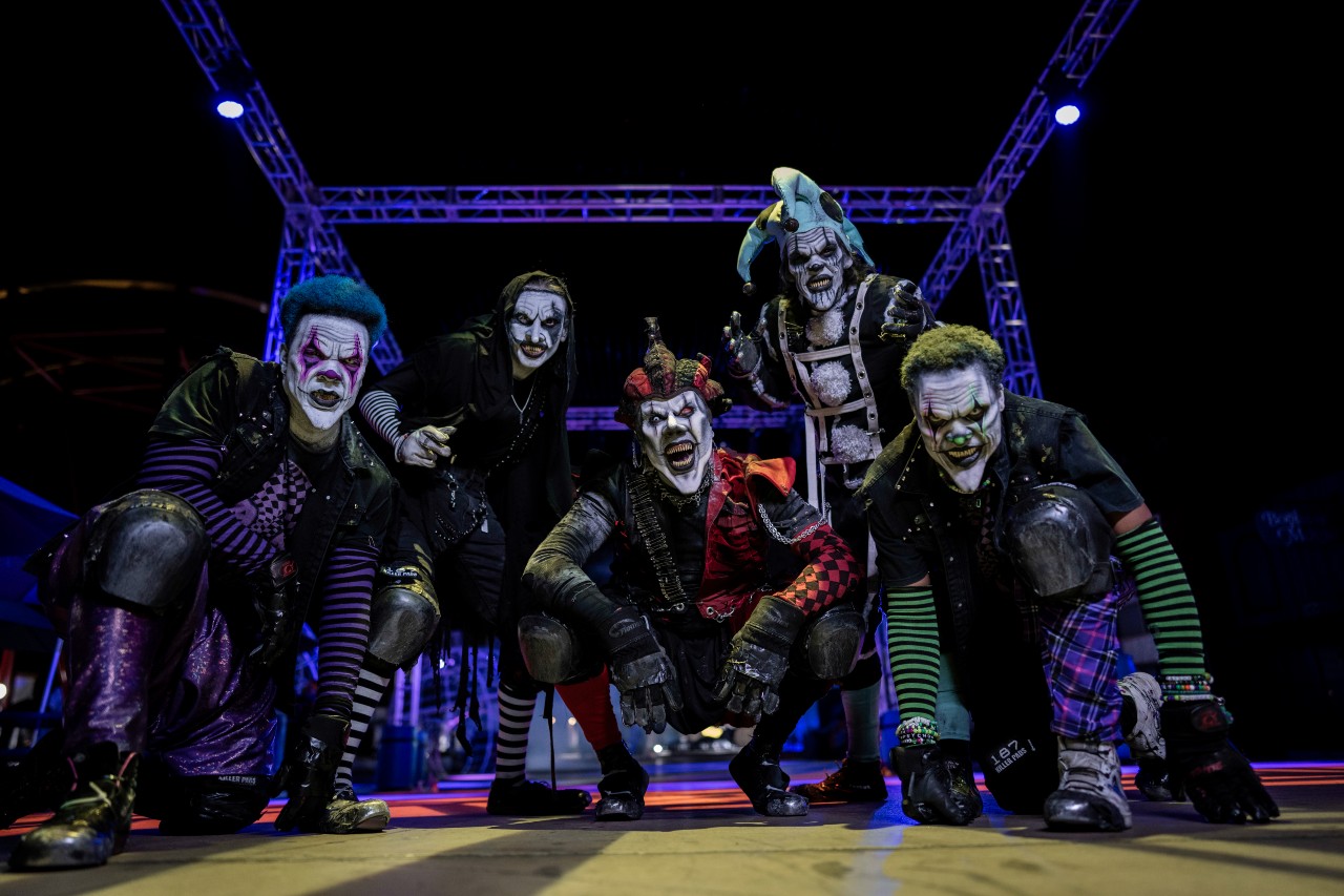 5 scareactor clowns pose for the camera
